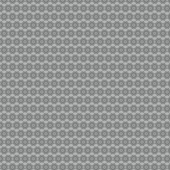 Fototapeta premium Repeating pattern of intricate floral designs in shades of gray