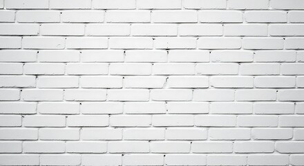 Close-up of a textured white brick wall, with subtle shadows and clean lines