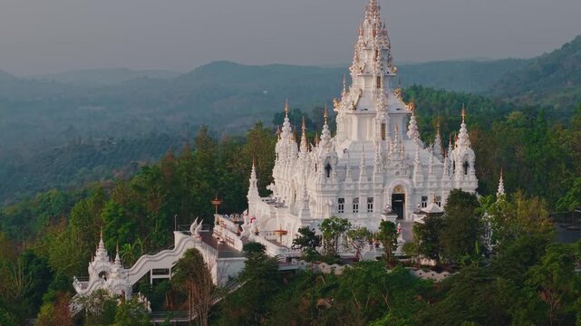 White pagoda Loha Prasat Sri Mueang Pong temple in Chiang Mai, Thailand Aerial view.