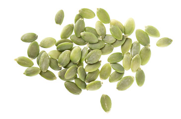 Pumpkin seeds isolated on white background. Green peeled pumpkin seeds. Clipping path. Top view.