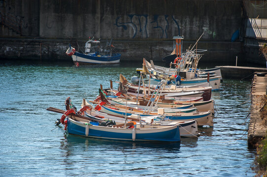 traditional Mediterranean fishing boats in Italy, moored in Nervi harbor