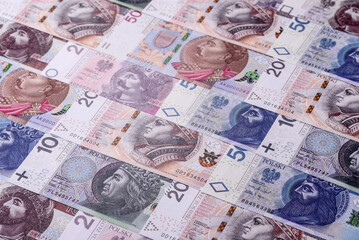 Obraz premium Polish zloty paper money, banknotes for exchange and financial transactions. The Polish zloty