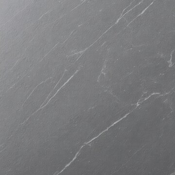 Soapstone smooth texture, soft grey matte finish with subtle veining, tactile stone