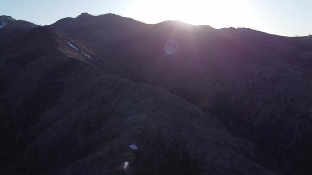 Low mountains at sunset 
