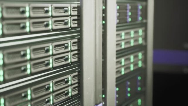 Backup rack showing active LED indicators redundant storage arrays, mirrored drives, clean organized layout, soft depth of field, cool lighting suggests