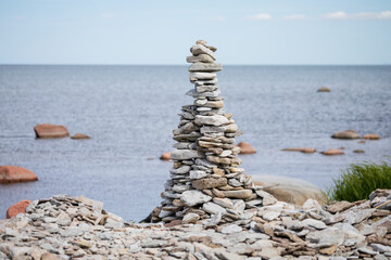 Fototapeta premium Balanced Stone Tower on Beach at Ohessaare Cliff, Saaremaa, Estonia