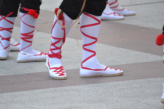Traditional fiesta de la vaquilla celebration in colmenar viejo highlighting festive dance attire. Spanish traditions, folk festival