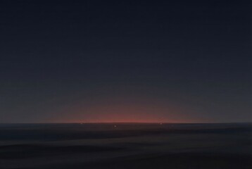 Fototapeta premium Dark horizon with subtle red glow – global uncertainty concept