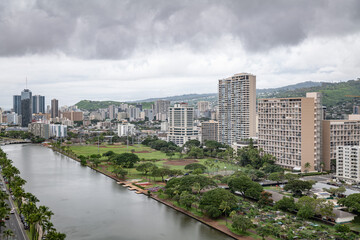 Fototapeta premium City of Honolulu, Ohau, Hawaii winter. Ala Wai Canal, Waikiki. Koʻolau Range (shield volcano). Kona storm