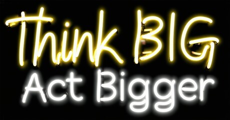 Fototapeta premium Bright neon sign displays motivational phrase. Text reads Think BIG Act Bigger against black background. Simple, bold design.