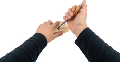 Fototapeta premium Hands carefully carving a piece of light colored wood with a sharp metal chisel with a wooden handle woodworking craftsmanship tool craft detail carpenter transparent background