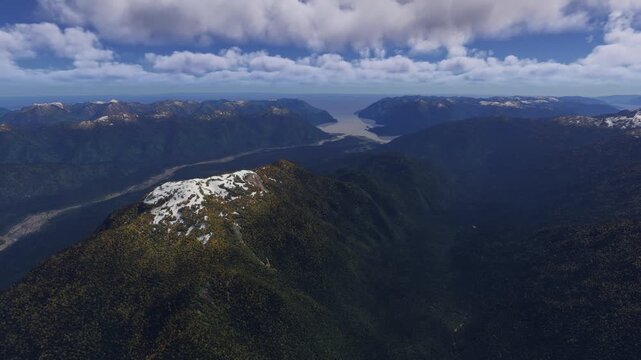 Side aerial drone view of the snow in Pumalin National Park in Chaiten. Los Lagos. Chile