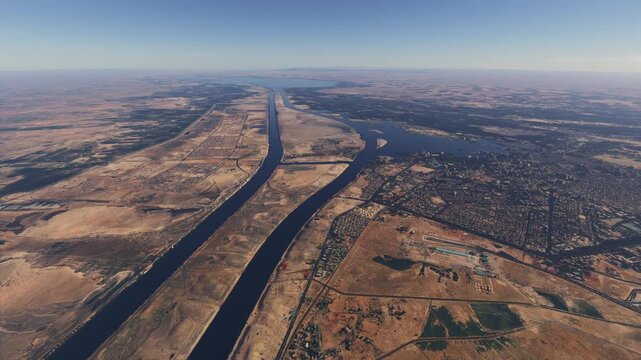 Circular aerial drone view of the Suez Canal. Egypt