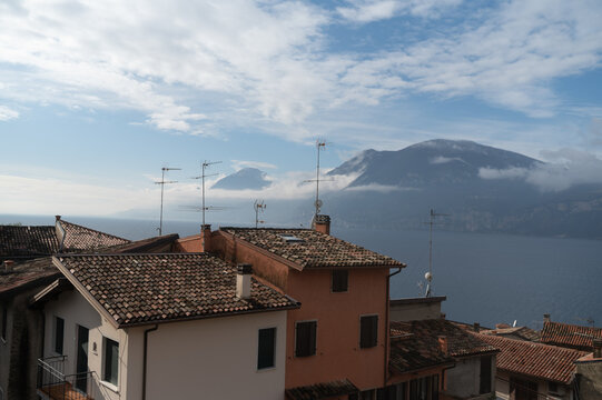 Scenic view of rooftops and Lake Garda