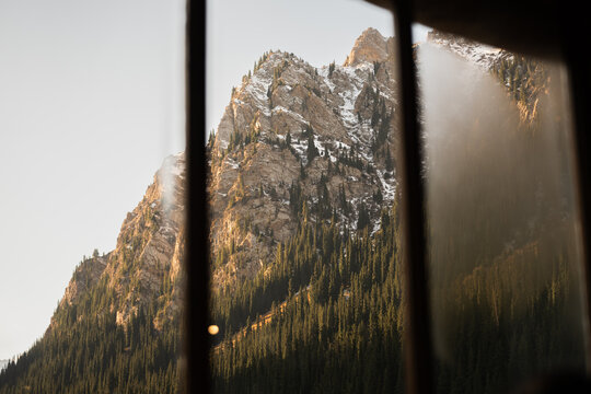 Rocky Mountain Peak Through Cabin Window