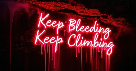 Fototapeta premium Bright neon sign displays motivational phrase against dark, dripping background. Intense red hues dominate composition.