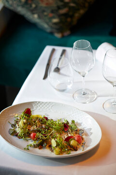 Elegant gourmet dish presentation in upscale setting