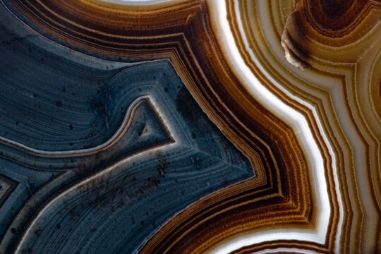 Close-up of natural agate gemstone with brown layers