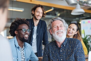 Fototapeta premium Diverse creative team smiling and collaborating together in a modern open plan office.