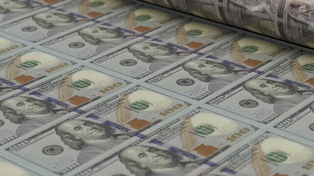 Close-up loop animation of 100 dollar banknotes moving through printing press, symbolizing inflation, monetary policy and economic pressure. Ideal for investment, fintech and corporate media.