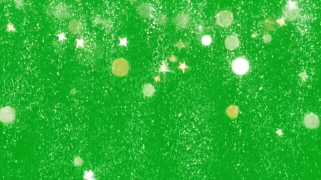 Glittering stars in festive green background with bright warm lighting for celebration design