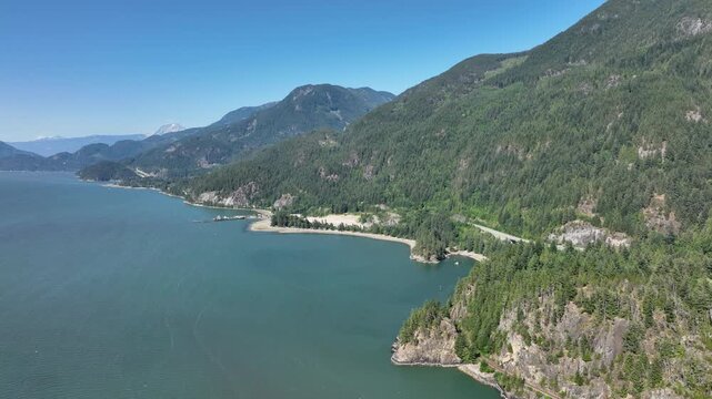 Aerial View of Sea to Sky Highway Winding Along Howe Sound Coast, British Columbia Canada