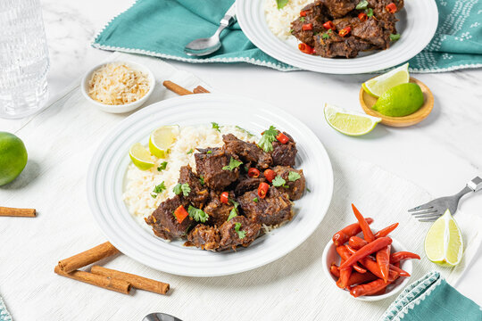 Spicy Thai food. Beef rendang with coconut rice