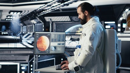 Fototapeta premium Astronaut looking at planet visualization before stepping out for scheduled operations outside space station. Cosmonaut in spacecraft powered by advanced engineering landing on planet