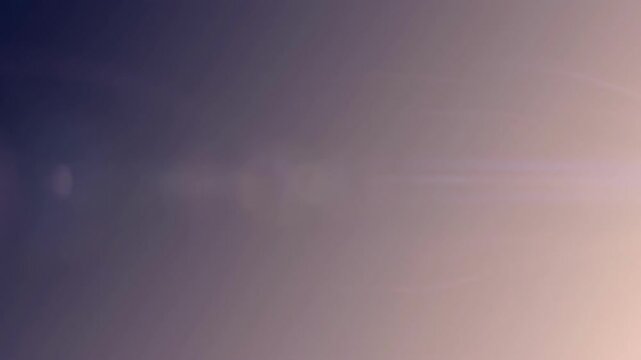 A vibrant lens flare creates a dynamic and energetic mood, perfect for illustrating concepts of innovation, inspiration, or a sense of wonder. Ideal f