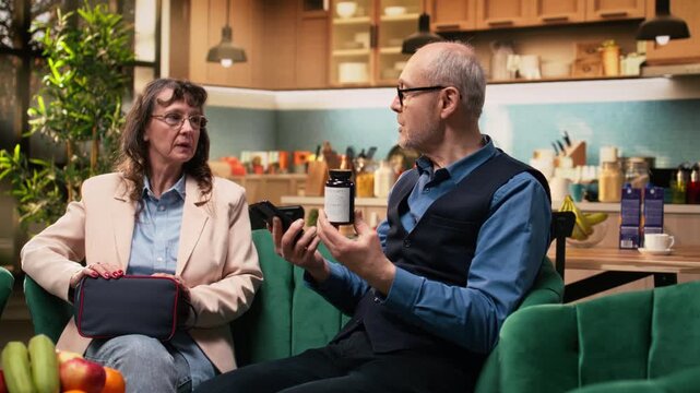 Aged senior man reading pill box labels and supplements for medical routine, in-home personal care for longevity. Healthcare support focuses on treatment accuracy, recovery and wellbeing.