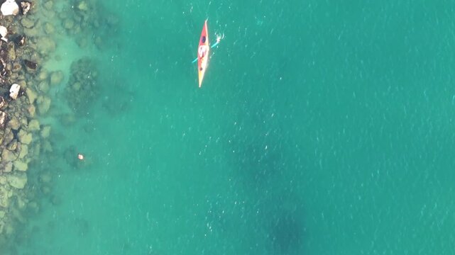 Close view of canoe moving gently across calm sea near Omis, Dalmatia, Croatia.