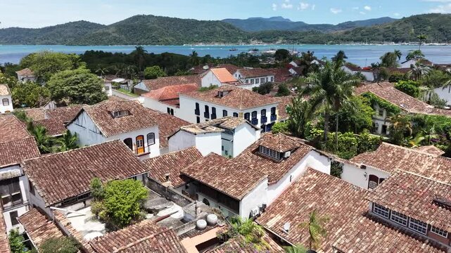 Aerial view of Paraty colonial town with tropical ocean and mountains Brazil