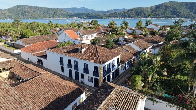 Aerial view of Paraty colonial town with tropical ocean and mountains Brazil