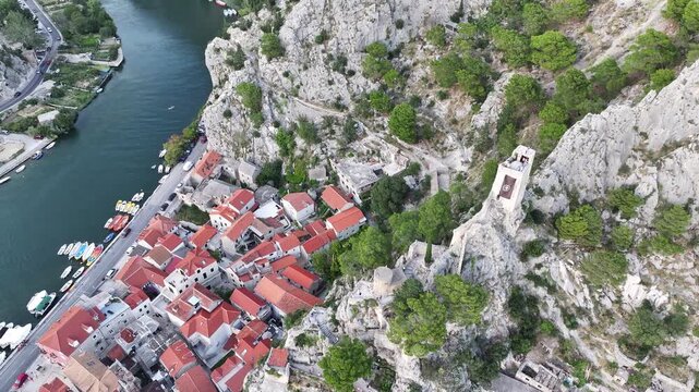 View of Mirabela fortress overlooking Omis old town and Adriatic coast in Croatia.