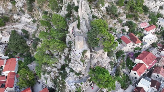 Detailed close view of Mirabela fortress tower above Omis old town, Croatia.
