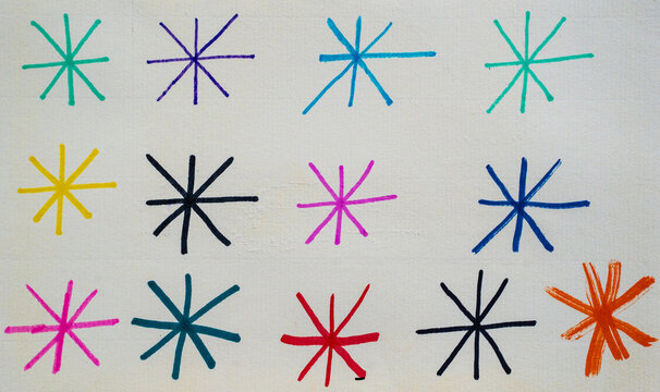 Patr&oacute;n de asteriscos coloridos dibujados a mano sobre fondo claro, dise&ntilde;o abstracto creativo y minimalista