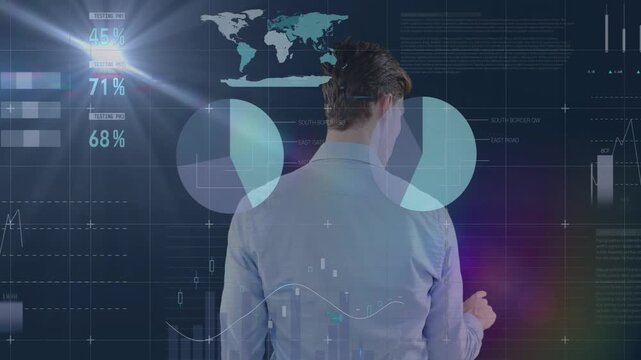 Man standing facing transparent display, raising hand, tapping and swiping, updating finance charts