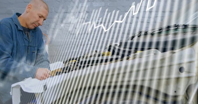 Tech leaning over bumper sanding cloth as tool scraping for repair scanlines and jagged line rising