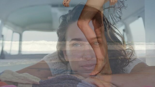 Woman reclining in van viewing barefoot walker entering frame, dissolving quiet mood for travel ads