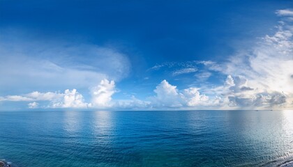 panorama of cloud clear sky background for summer vacation concept at ocean and summer sea water with sunlight of beautiful cloudy