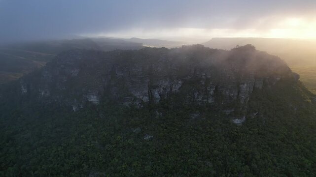 Entering low cloud cover during ascent to overcome mountain peak getting lost and returning home