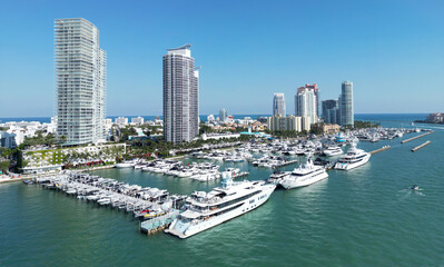 Marina in Miami Beach Florida with boats. Miami Beach coastal skyline with boats. Aerial view of Miami Beach with marina, yachts and coastal. Miami Beach marina and Biscayne Bay.