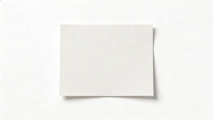 Fototapeta premium Blank sheet of paper on white surface