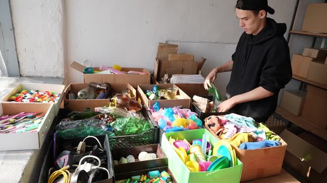 Sorting household waste. Separation of waste into fractions: plastic, glass, paper, metal, organic