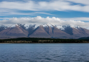 Majestic mountains reflecting on serene glacial lake waters under a clear sky