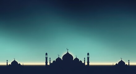 Silhouette of Mosque against twilight sky.