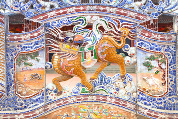 Beautiful Decoration on a Wall of a Vietnamese Temple in Hoi An, Vietnam