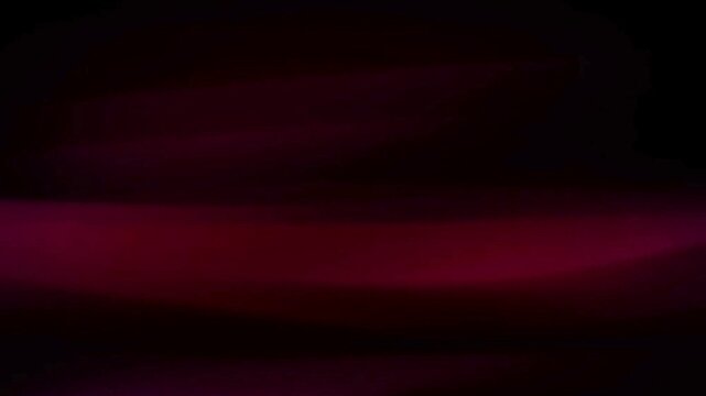 Deep Crimson and Violet Hues Swirl and Blend Together in Abstract Dark Ambiance