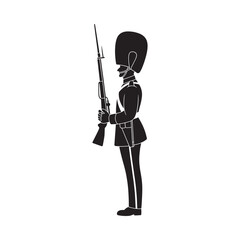 Fototapeta premium Silhouette of a british guardsman standing at attention with a rifle