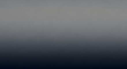 Fototapeta premium Moody abstract gradient background with subtle speckles, transitioning from deep charcoal gray to dark navy.